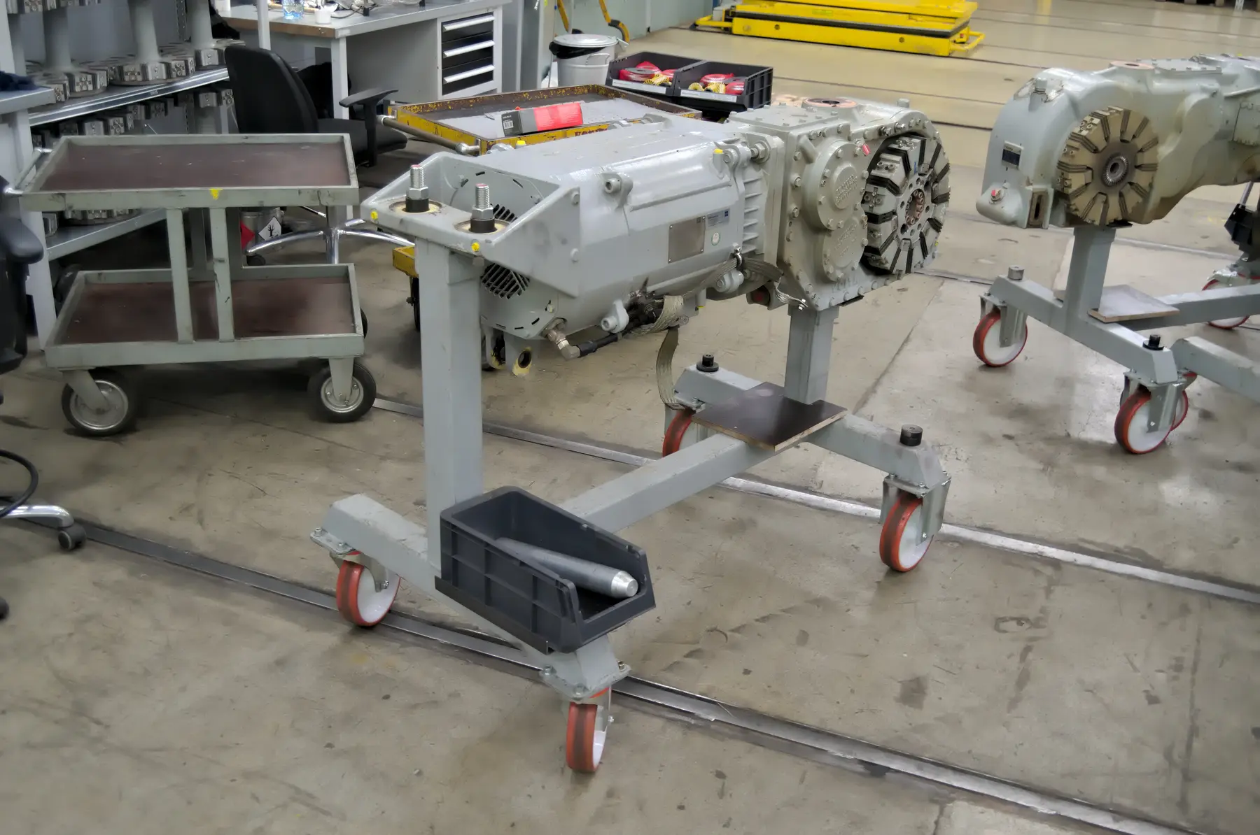 Electric traction motor and transmission assemblies installed on a test stand